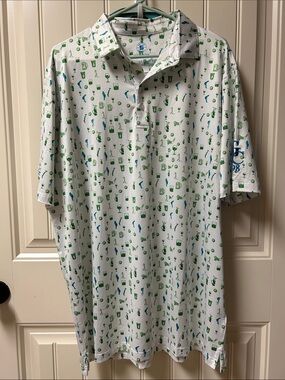 Coby Steven’s Classic White Polo with Green & Blue Mini Print